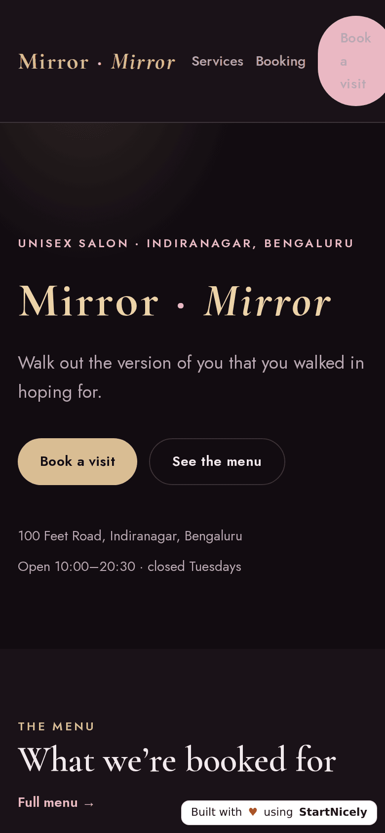 The salon's home page on a phone